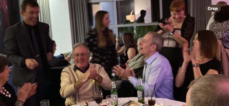 John hosting a corporate team event